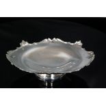 A George V hallmarked silver tazza of shaped circular outline,