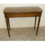 Good quality mahogany fold over card table with tapered fluted legs
