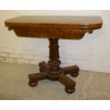 High quality mahogany and cross banded fold over tea table on a 4 splay base with carved pedestal