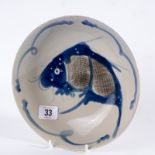 Oriental dish decorated with a fish