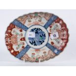 Oval oriental plate decorated in Imari colours