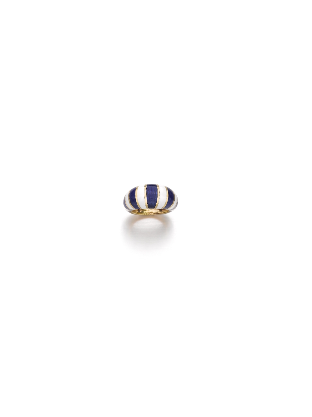 A White And Blue Enamel Ring, by VAN CLEEF & ARPELS Designed as a bombé polished gold, enhanced by