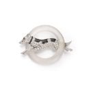 An Art Deco Dog Brooch Designed as crossing an opaque rock crystal circle, set with circular-cut