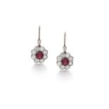 A Pair Of Ruby And Diamond Earrings Each contouring upon a cushion-shape ruby within a brilliant cut