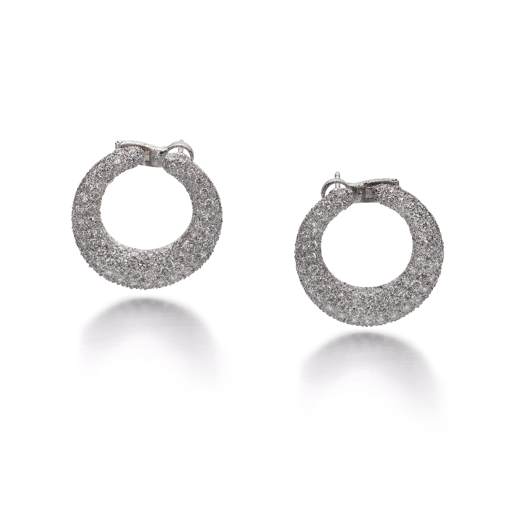 A Pair Of Diamond Earrings, by CARTIER Designed as open hoops with a bombé pavé-set brilliant-cut