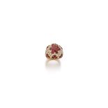 A Ruby And Diamond "Dome" Ring Of bombé design, set with circular-cut rubies and brilliantcut