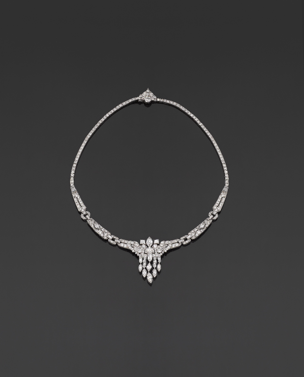 A Rare Art Deco Diamond Necklace Designed as a geometrical, articulated openwork, entirely set