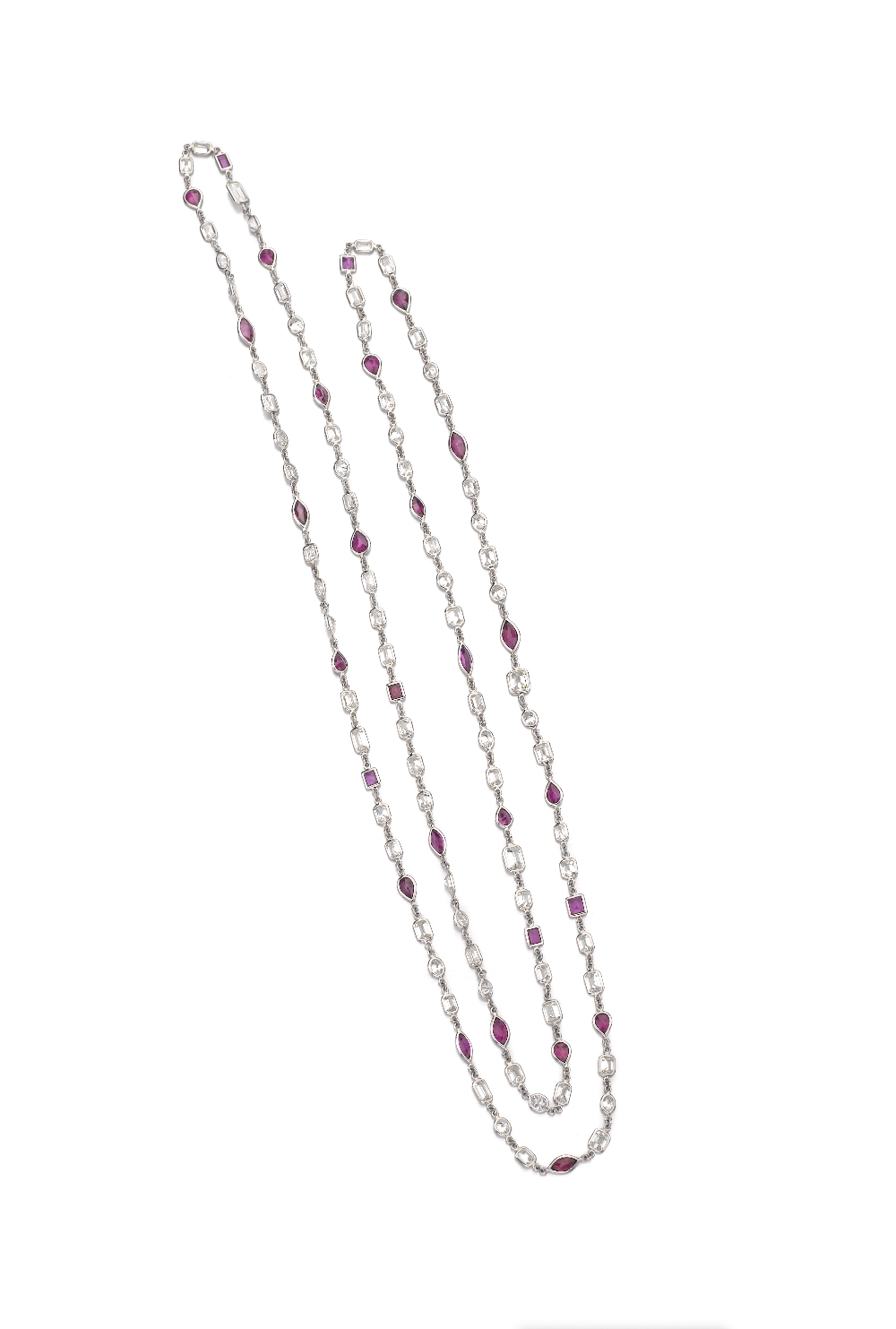 A Rare Diamond And Ruby Long Chain Necklace Designed as oval and emerald-cut diamonds and