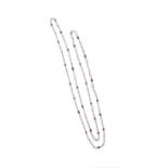 A Rare Diamond And Ruby Long Chain Necklace Designed as oval and emerald-cut diamonds and