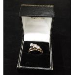 An Art Deco 18ct gold ring, with three s