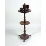An Edwardian carved wooden two tier Smok