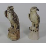 A pair of similar carved speckled marble