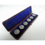 An attractive set of 6 cased Silver Butt