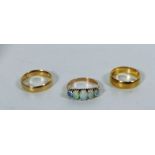 An attractive gold 5 stone Opal Ring, a