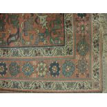 A small rose ground Oriental Rug, with m