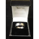 An 18ct white gold thick band Ring, with