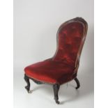 A good Victorian rosewood Nursing Chair,