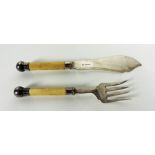 A pair of silver mounted ivory handled F