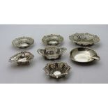 Four pierced silver Bon Bon Dishes, vary