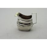 A small elegant English silver Cream Jug