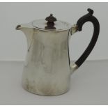 A heavy plain silver Hot-Water Pot, with