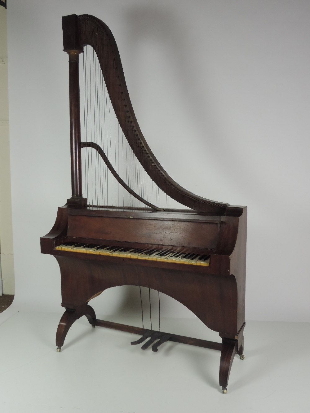 A rare and unusual Regency mahogany French Harpsichord,