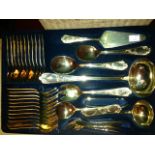 A large and unusual 22ct gold plated Cutlery Service, of seventy two pieces, dinner forks, knives,