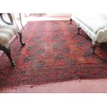 A rust red ground Oriental Carpet, with