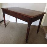 A mahogany Occasional Table, on four tur