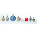 EIGHT CHINESE SNUFF BOTTLES. Twentieth century. Five ceramic including a reclining woman, 2" to 4.