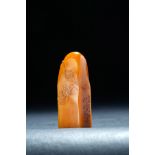 SIGNED CHINESE TIAN HUANG STONE SEAL. Signed by Wu Hu Fan (1894-1968). Carving of a scholar and