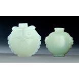 TWO CHINESE WHITE JADE SNUFF BOTTLES. Nineteenth-20th century. One with double fish and the