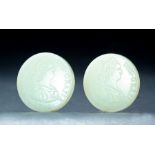 RARE PAIR OF CHINESE WHITE JADE COINS. Qing Dynasty (18th/19th Century). Finely carved replicas of
