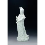 CHINESE DEHUA CERAMIC BUDDHA GUAN YIN. Nineteenth century. Blanc de Chine standing figure with a