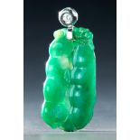 FINE ICE JADEITE CARVED PENDANT. Nineteenth century. Two green bean pods, one open, with a bat and
