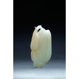 CHINESE CARVED JADE BUDDHA HAND PENDANT. Eighteenth century. Brown leaf on top. Minor flake. 2.75"l.