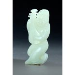 CHINESE WHITE JADE CARVING OF A MUSICIAN. Nineteenth-20th century. Dancing figure with a hat and