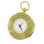 Contemporary brass circular eight day alarm clock, the 2.5" white dial within an egg and dart cast