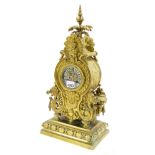 Brass two train balloon mantel clock, the Japy Freres movement striking on a bell, the 3" silvered