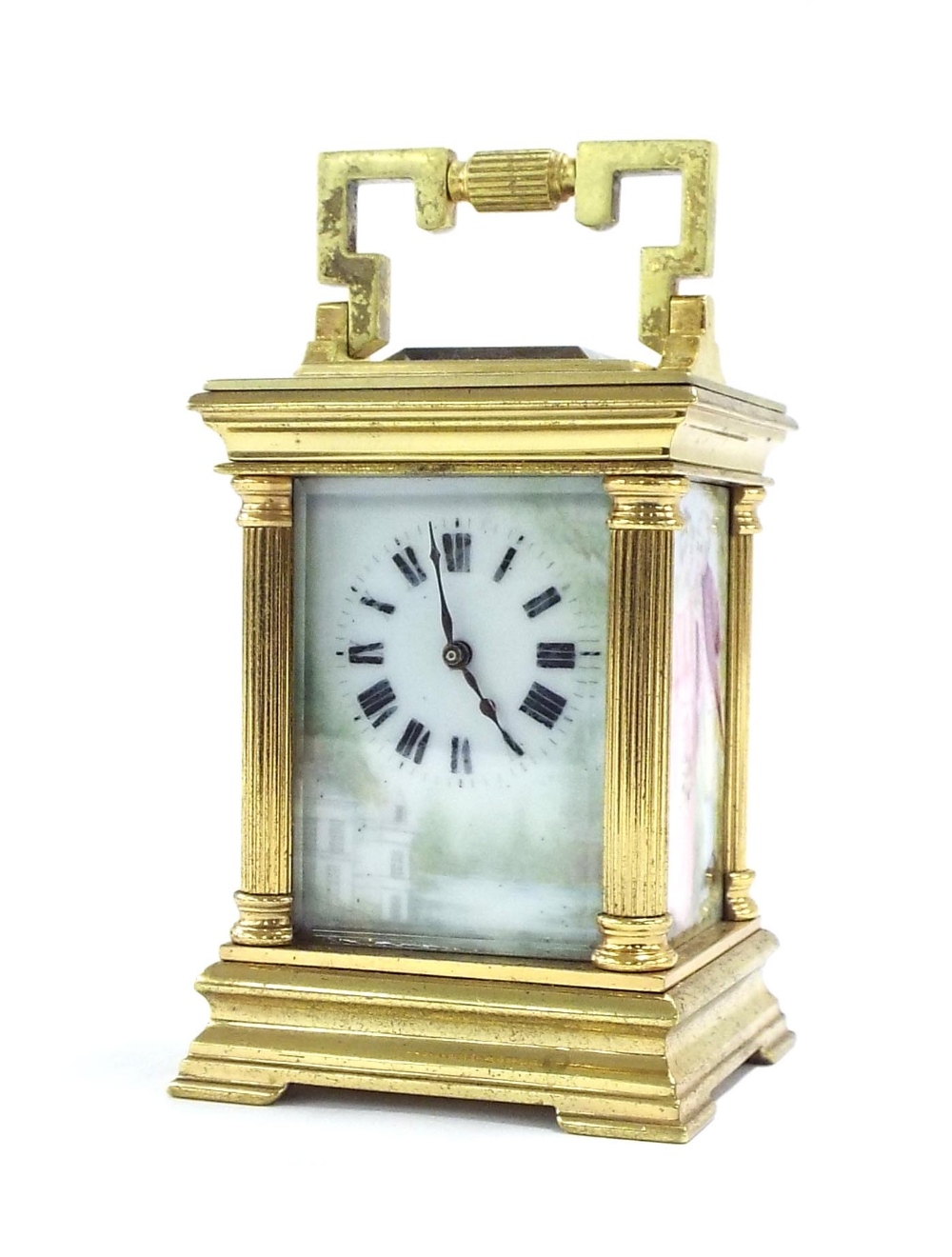 Miniature French porcelain panelled carriage clock timepiece, the front painted with a country house