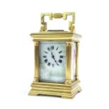 Miniature French porcelain panelled carriage clock timepiece, the front painted with a country house