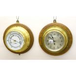 Brass bulkhead single train wall clock, the 5.5" silvered dial signed Barker, Kensington within a