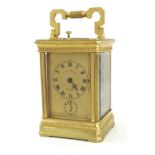Repeater carriage alarm clock striking on a gong, the principal dial signed T. Kirkpatrick & Co, New