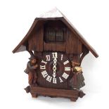 Black Forest triple weight musical cuckoo clock, the case back signed DRGM, 0Z65, the 6" turned