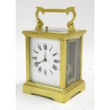 Repeater carriage clock striking on a gong, within a corniche brass case, 6.25" high