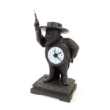 French novelty cast iron alarm timepiece in the form of a standing bearded man, the 2.25" blue