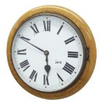 Light oak single fusee 12" wall dial clock, within a turned surround