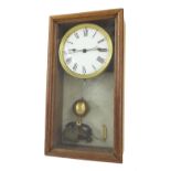 Oak cased Brillie style electric wall clock, the 6" convex white dial within a glazed case with
