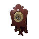 Mahogany Arts & Crafts two train wall clock, the 7.25" brass dial enclosing a stylised rural