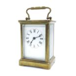 Carriage clock timepiece, within a corniche brass case, 5.5" high